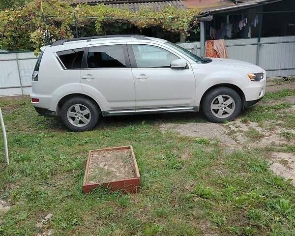 Білий Міцубісі Аутлендер, об'ємом двигуна 2.3 л та пробігом 288 тис. км за 12000 $, фото 15 на Automoto.ua