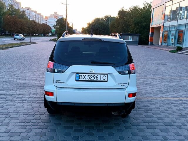 Белый Мицубиси Аутлендер, объемом двигателя 2.4 л и пробегом 187 тыс. км за 9700 $, фото 3 на Automoto.ua