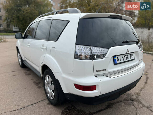 Білий Міцубісі Аутлендер, об'ємом двигуна 2.36 л та пробігом 260 тис. км за 9700 $, фото 24 на Automoto.ua