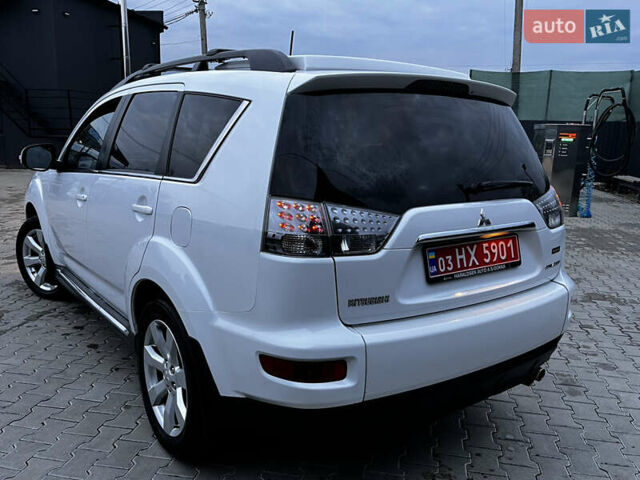 Белый Мицубиси Аутлендер, объемом двигателя 2.3 л и пробегом 161 тыс. км за 11150 $, фото 14 на Automoto.ua