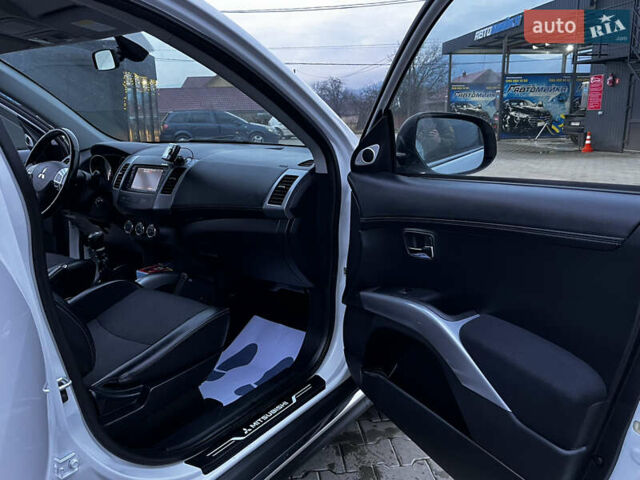 Белый Мицубиси Аутлендер, объемом двигателя 2.3 л и пробегом 161 тыс. км за 11150 $, фото 34 на Automoto.ua