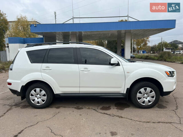 Білий Міцубісі Аутлендер, об'ємом двигуна 2.36 л та пробігом 260 тис. км за 9700 $, фото 21 на Automoto.ua