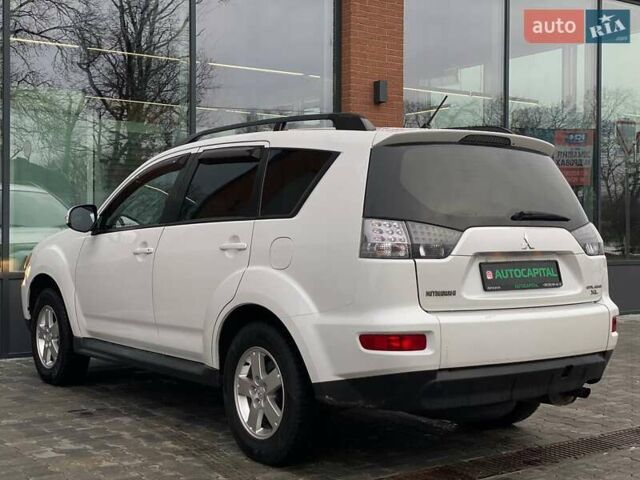 Білий Міцубісі Аутлендер, об'ємом двигуна 2 л та пробігом 248 тис. км за 10490 $, фото 10 на Automoto.ua