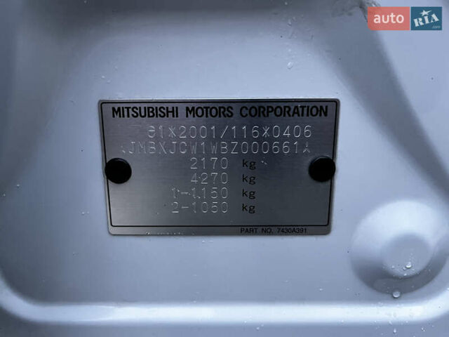 Белый Мицубиси Аутлендер, объемом двигателя 2.3 л и пробегом 161 тыс. км за 11150 $, фото 48 на Automoto.ua