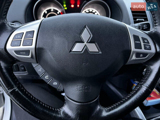 Белый Мицубиси Аутлендер, объемом двигателя 2.3 л и пробегом 161 тыс. км за 11150 $, фото 42 на Automoto.ua