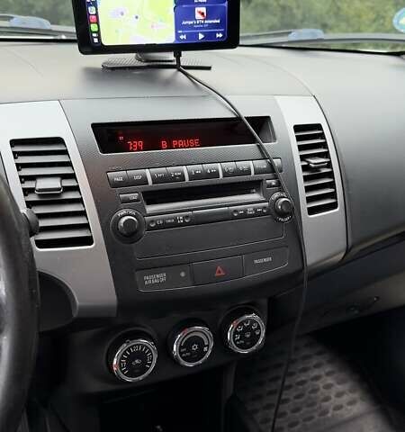 Белый Мицубиси Аутлендер, объемом двигателя 2 л и пробегом 172 тыс. км за 10999 $, фото 19 на Automoto.ua