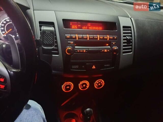 Белый Мицубиси Аутлендер, объемом двигателя 2.2 л и пробегом 232 тыс. км за 10950 $, фото 23 на Automoto.ua