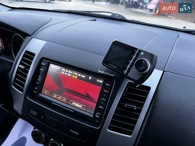 Белый Мицубиси Аутлендер, объемом двигателя 2.3 л и пробегом 161 тыс. км за 11150 $, фото 47 на Automoto.ua