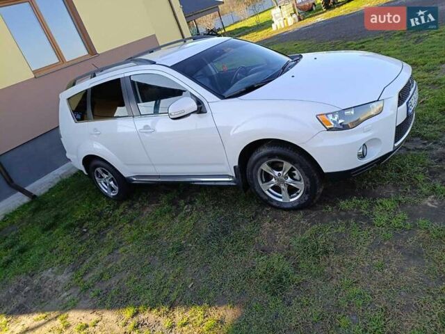 Белый Мицубиси Аутлендер, объемом двигателя 2.2 л и пробегом 232 тыс. км за 10950 $, фото 4 на Automoto.ua