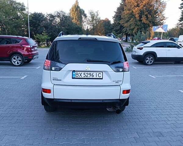 Белый Мицубиси Аутлендер, объемом двигателя 2.4 л и пробегом 187 тыс. км за 9499 $, фото 23 на Automoto.ua