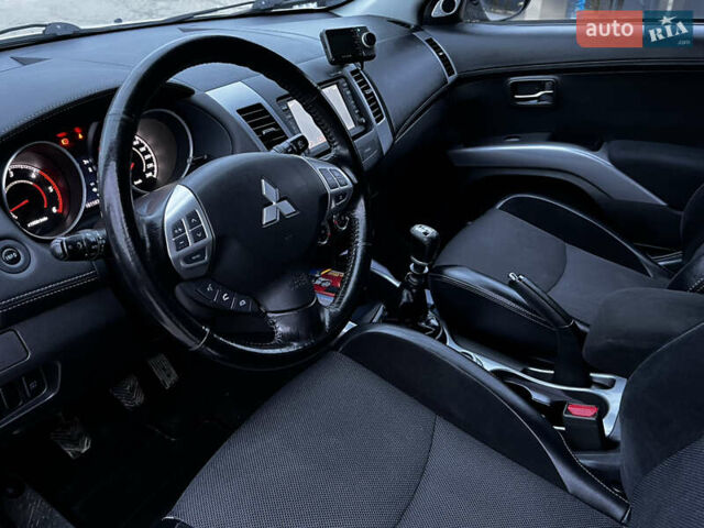 Белый Мицубиси Аутлендер, объемом двигателя 2.3 л и пробегом 161 тыс. км за 11150 $, фото 23 на Automoto.ua