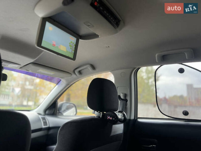 Білий Міцубісі Аутлендер, об'ємом двигуна 2.36 л та пробігом 260 тис. км за 9700 $, фото 17 на Automoto.ua