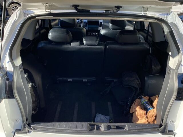 Белый Мицубиси Аутлендер, объемом двигателя 2.4 л и пробегом 154 тыс. км за 12500 $, фото 9 на Automoto.ua