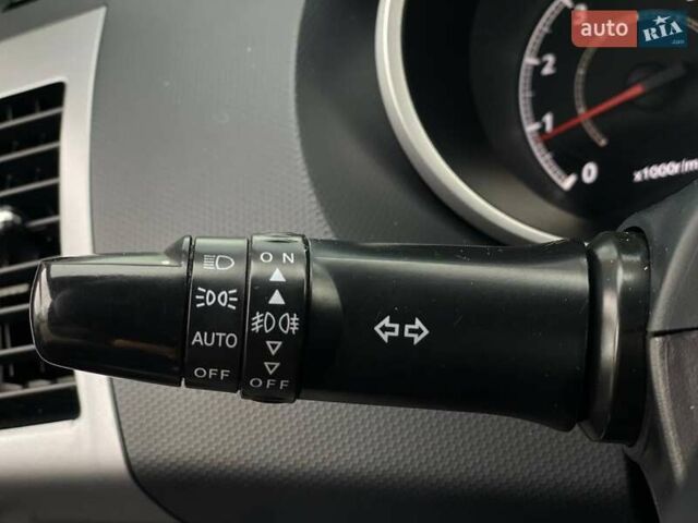 Білий Міцубісі Аутлендер, об'ємом двигуна 2 л та пробігом 248 тис. км за 10490 $, фото 25 на Automoto.ua