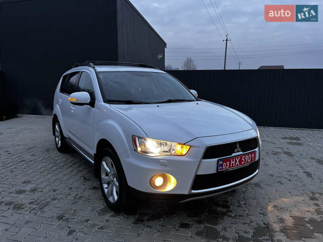 Белый Мицубиси Аутлендер, объемом двигателя 2.3 л и пробегом 161 тыс. км за 11150 $, фото 49 на Automoto.ua