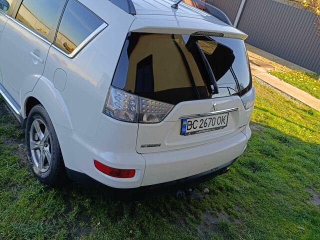 Белый Мицубиси Аутлендер, объемом двигателя 2.2 л и пробегом 232 тыс. км за 11100 $, фото 4 на Automoto.ua