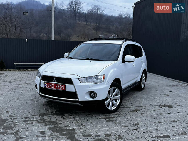 Белый Мицубиси Аутлендер, объемом двигателя 2.3 л и пробегом 161 тыс. км за 11150 $, фото 1 на Automoto.ua