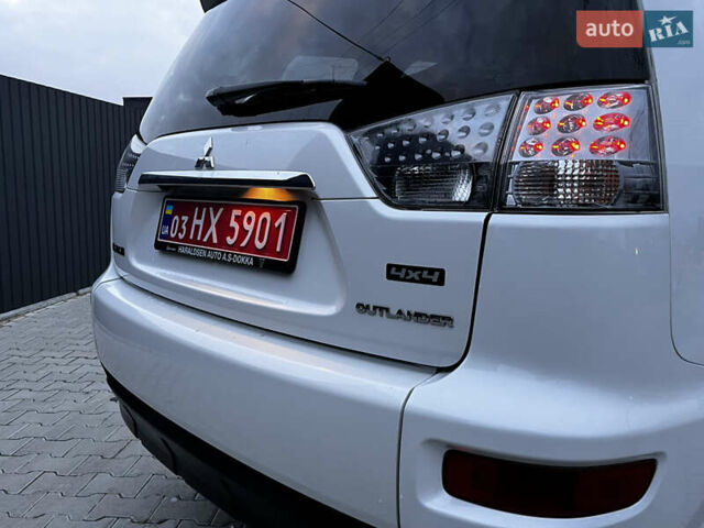 Белый Мицубиси Аутлендер, объемом двигателя 2.3 л и пробегом 161 тыс. км за 11150 $, фото 17 на Automoto.ua