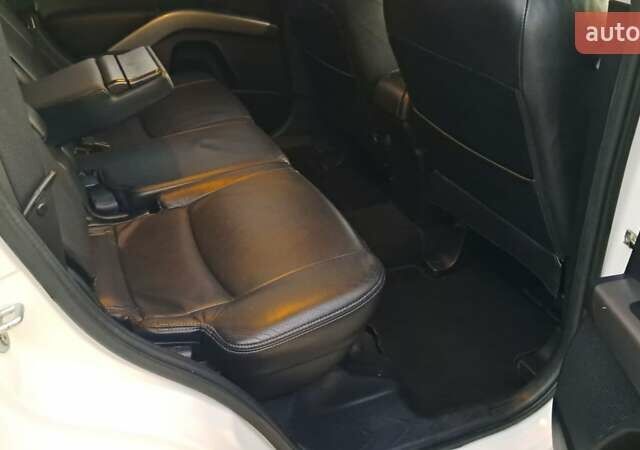 Белый Мицубиси Аутлендер, объемом двигателя 2.27 л и пробегом 191 тыс. км за 10999 $, фото 22 на Automoto.ua