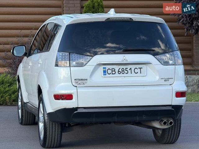 Белый Мицубиси Аутлендер, объемом двигателя 3 л и пробегом 269 тыс. км за 10500 $, фото 24 на Automoto.ua