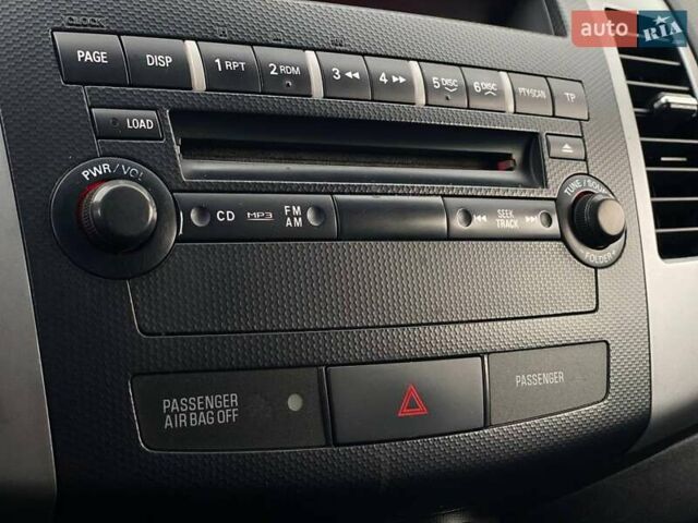 Білий Міцубісі Аутлендер, об'ємом двигуна 2 л та пробігом 248 тис. км за 10490 $, фото 31 на Automoto.ua