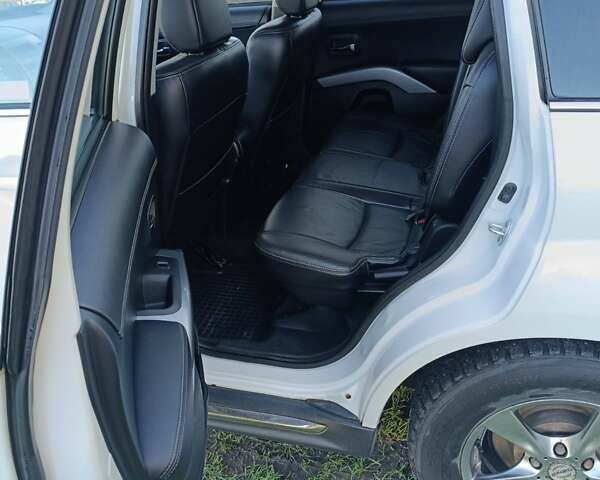 Белый Мицубиси Аутлендер, объемом двигателя 2.2 л и пробегом 232 тыс. км за 10950 $, фото 14 на Automoto.ua