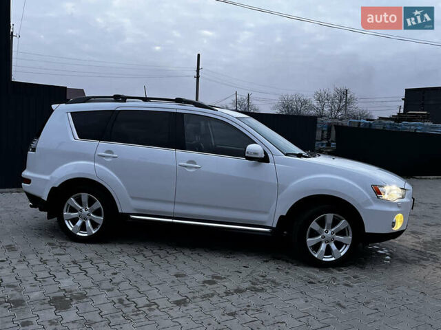 Белый Мицубиси Аутлендер, объемом двигателя 2.3 л и пробегом 161 тыс. км за 11150 $, фото 6 на Automoto.ua