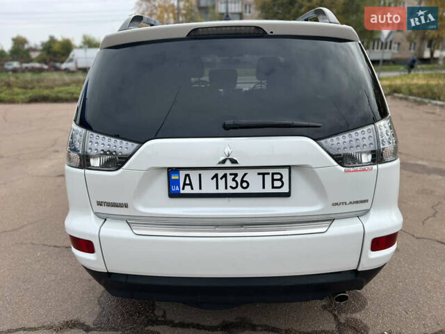 Білий Міцубісі Аутлендер, об'ємом двигуна 2.36 л та пробігом 260 тис. км за 9700 $, фото 23 на Automoto.ua