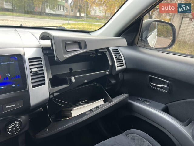 Білий Міцубісі Аутлендер, об'ємом двигуна 2.36 л та пробігом 260 тис. км за 9700 $, фото 13 на Automoto.ua