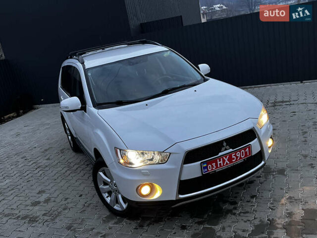 Белый Мицубиси Аутлендер, объемом двигателя 2.3 л и пробегом 161 тыс. км за 11150 $, фото 9 на Automoto.ua