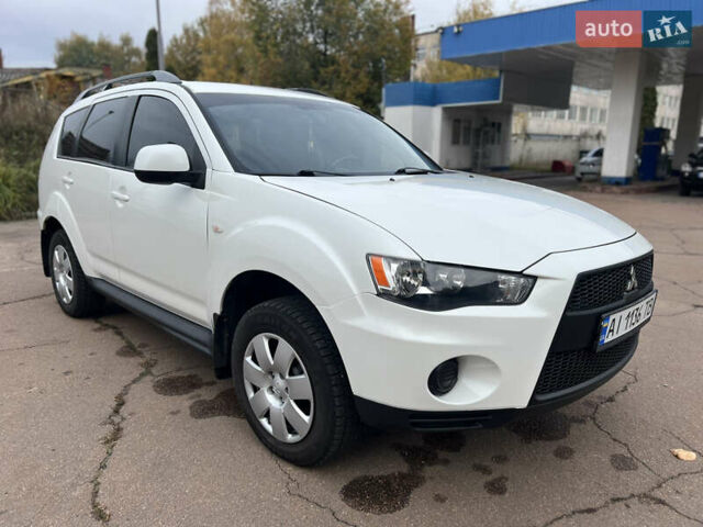 Білий Міцубісі Аутлендер, об'ємом двигуна 2.36 л та пробігом 260 тис. км за 9700 $, фото 20 на Automoto.ua