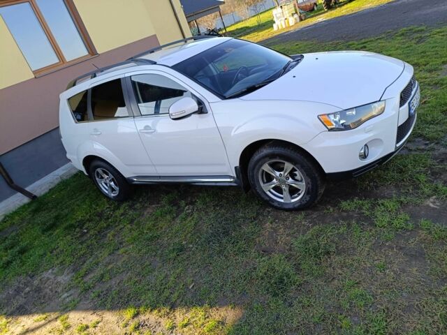 Белый Мицубиси Аутлендер, объемом двигателя 2.2 л и пробегом 232 тыс. км за 11100 $, фото 1 на Automoto.ua