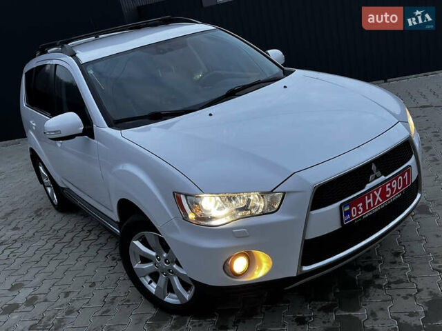 Белый Мицубиси Аутлендер, объемом двигателя 2.3 л и пробегом 161 тыс. км за 11150 $, фото 10 на Automoto.ua