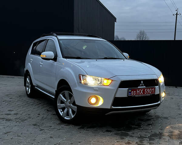 Белый Мицубиси Аутлендер, объемом двигателя 2.3 л и пробегом 161 тыс. км за 11150 $, фото 52 на Automoto.ua