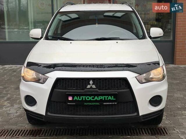 Білий Міцубісі Аутлендер, об'ємом двигуна 2 л та пробігом 248 тис. км за 10490 $, фото 5 на Automoto.ua