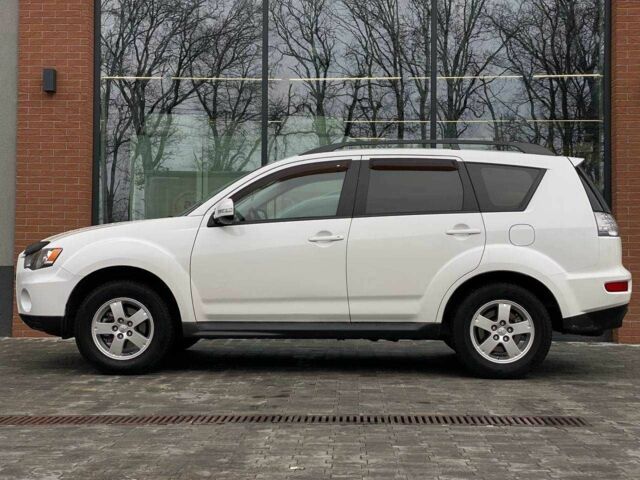 Белый Мицубиси Аутлендер, объемом двигателя 2 л и пробегом 248 тыс. км за 10490 $, фото 5 на Automoto.ua