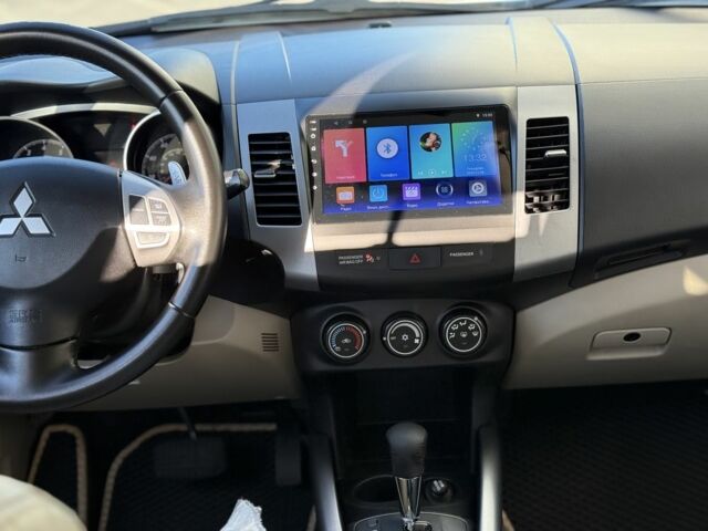 Белый Мицубиси Аутлендер, объемом двигателя 2.4 л и пробегом 223 тыс. км за 10500 $, фото 7 на Automoto.ua