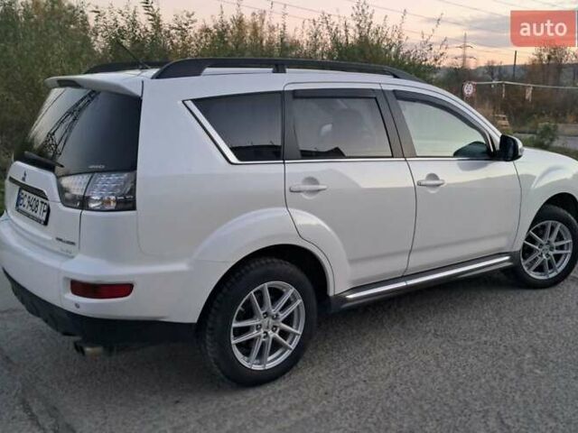 Белый Мицубиси Аутлендер, объемом двигателя 2.27 л и пробегом 191 тыс. км за 10999 $, фото 8 на Automoto.ua