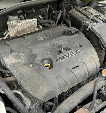 Белый Мицубиси Аутлендер, объемом двигателя 2 л и пробегом 172 тыс. км за 10999 $, фото 32 на Automoto.ua