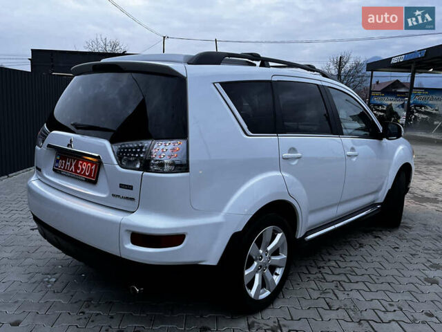 Белый Мицубиси Аутлендер, объемом двигателя 2.3 л и пробегом 161 тыс. км за 11150 $, фото 16 на Automoto.ua