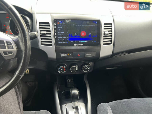 Білий Міцубісі Аутлендер, об'ємом двигуна 2.36 л та пробігом 260 тис. км за 9700 $, фото 14 на Automoto.ua