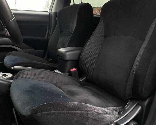 Білий Міцубісі Аутлендер, об'ємом двигуна 2 л та пробігом 248 тис. км за 10490 $, фото 38 на Automoto.ua