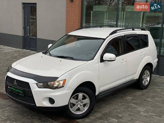 Білий Міцубісі Аутлендер, об'ємом двигуна 2 л та пробігом 248 тис. км за 10490 $, фото 1 на Automoto.ua
