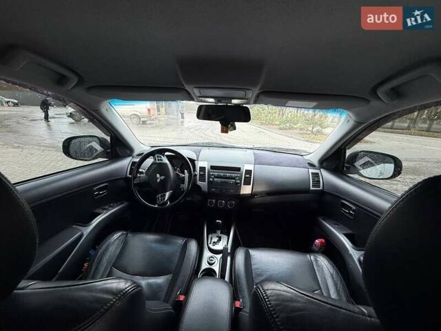 Білий Міцубісі Аутлендер, об'ємом двигуна 2.35 л та пробігом 192 тис. км за 8900 $, фото 10 на Automoto.ua