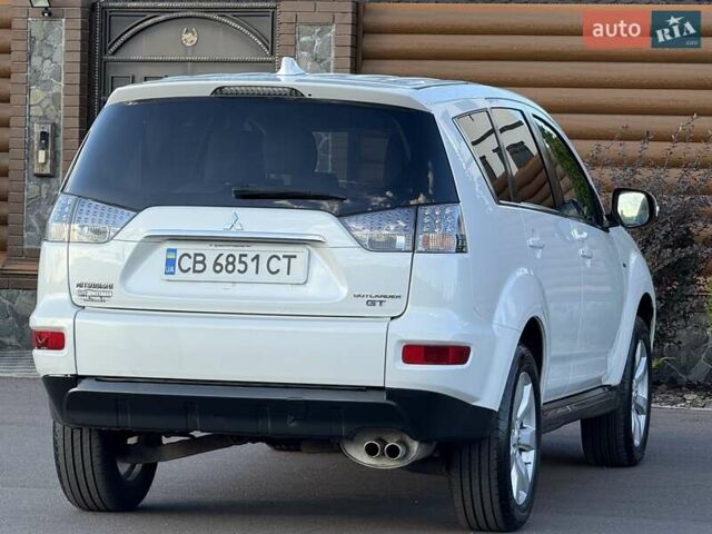 Белый Мицубиси Аутлендер, объемом двигателя 3 л и пробегом 269 тыс. км за 10500 $, фото 29 на Automoto.ua