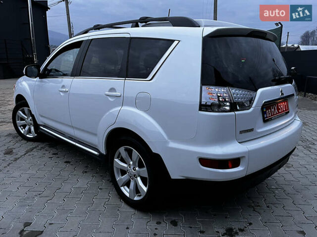 Белый Мицубиси Аутлендер, объемом двигателя 2.3 л и пробегом 161 тыс. км за 11150 $, фото 20 на Automoto.ua
