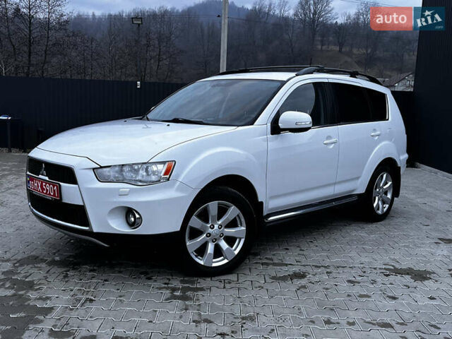 Белый Мицубиси Аутлендер, объемом двигателя 2.3 л и пробегом 161 тыс. км за 11150 $, фото 2 на Automoto.ua