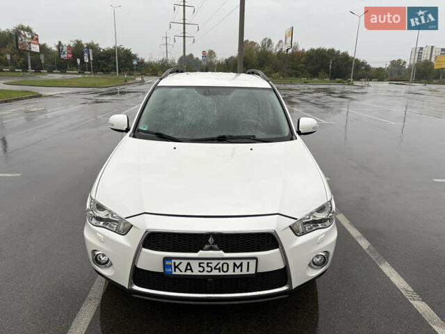 Белый Мицубиси Аутлендер, объемом двигателя 2.2 л и пробегом 136 тыс. км за 11900 $, фото 1 на Automoto.ua