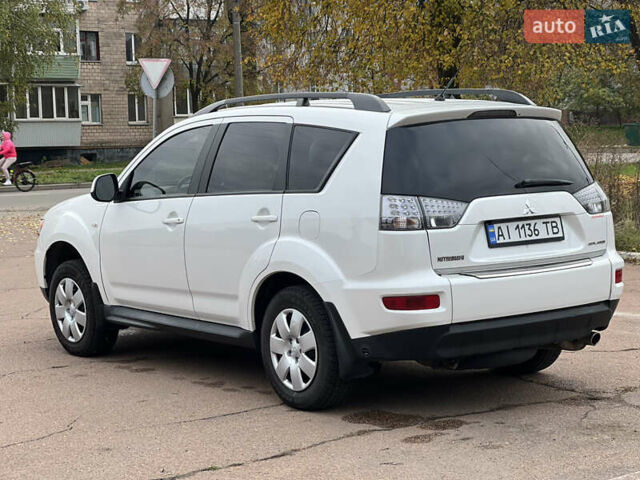Білий Міцубісі Аутлендер, об'ємом двигуна 2.36 л та пробігом 260 тис. км за 9700 $, фото 4 на Automoto.ua