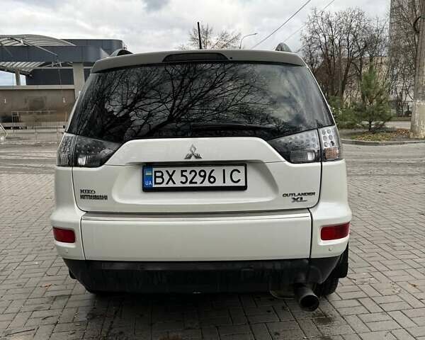 Белый Мицубиси Аутлендер, объемом двигателя 2.35 л и пробегом 192 тыс. км за 9300 $, фото 3 на Automoto.ua